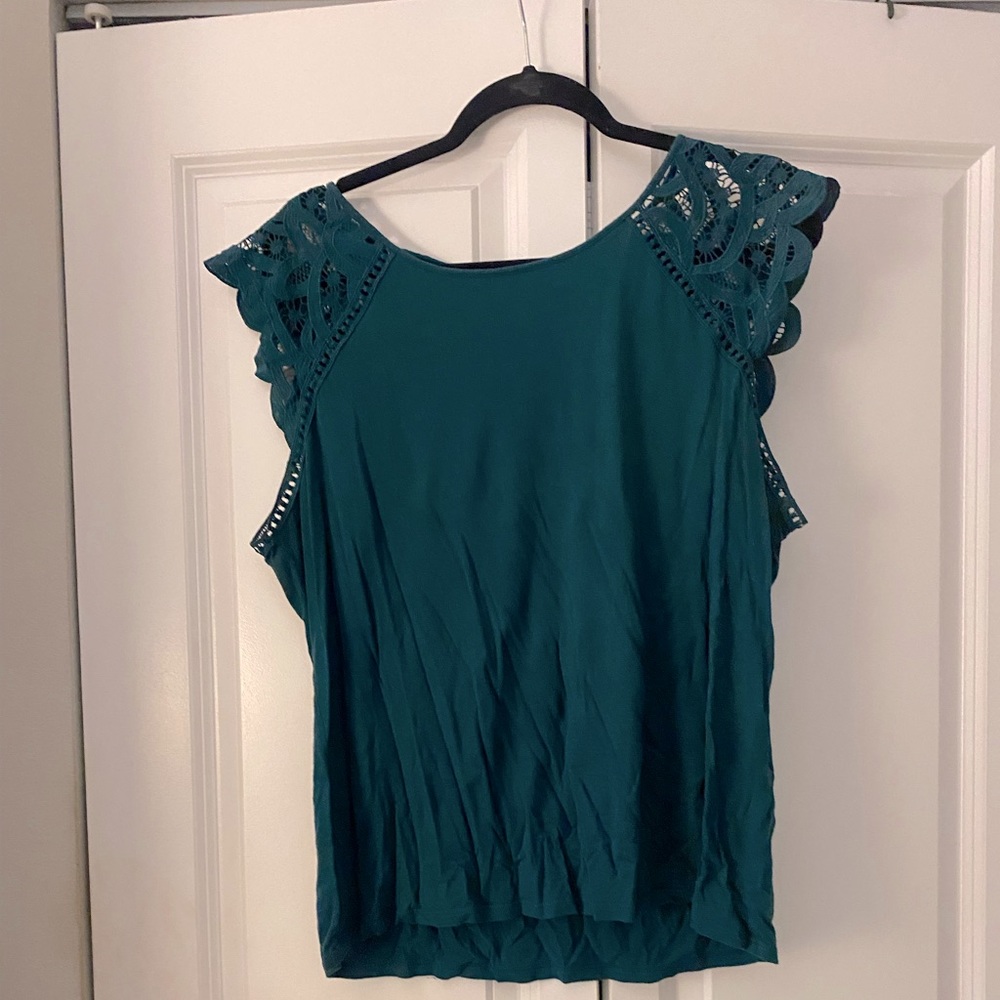 green t shirt with Lacey detail on sleeves